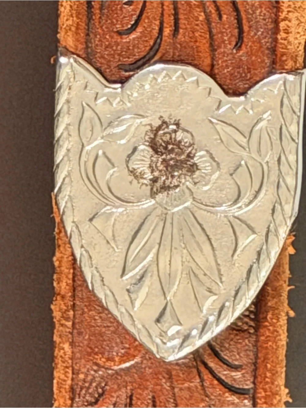 Vintage Western tooled leather belt with a three-piece engraved silver-tone 26